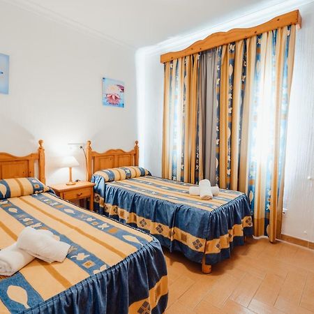 Apartamentos Punta Prima Beach Kültér fotó
