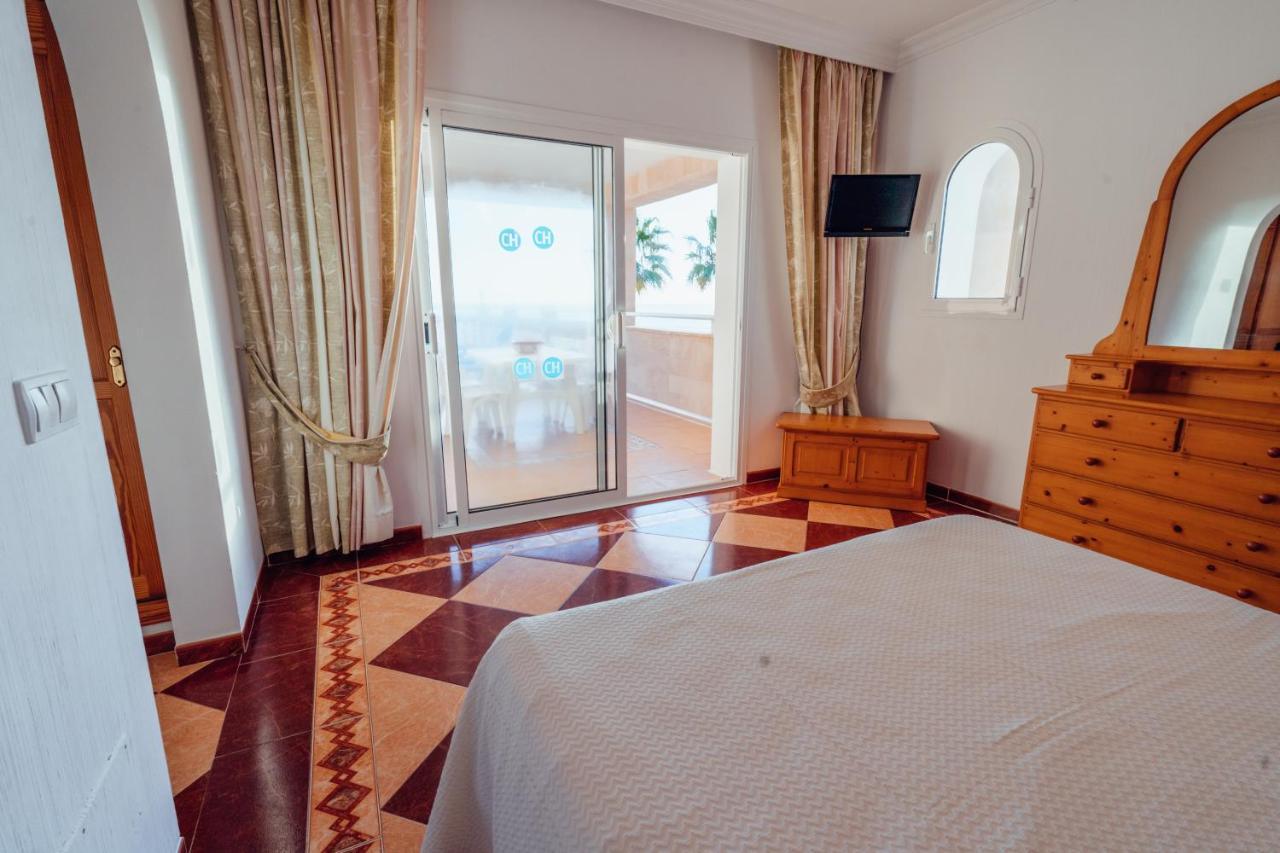 Apartamentos Punta Prima Beach Kültér fotó