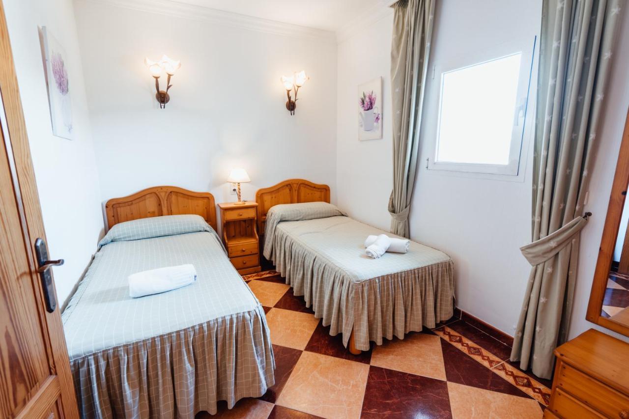 Apartamentos Punta Prima Beach Kültér fotó